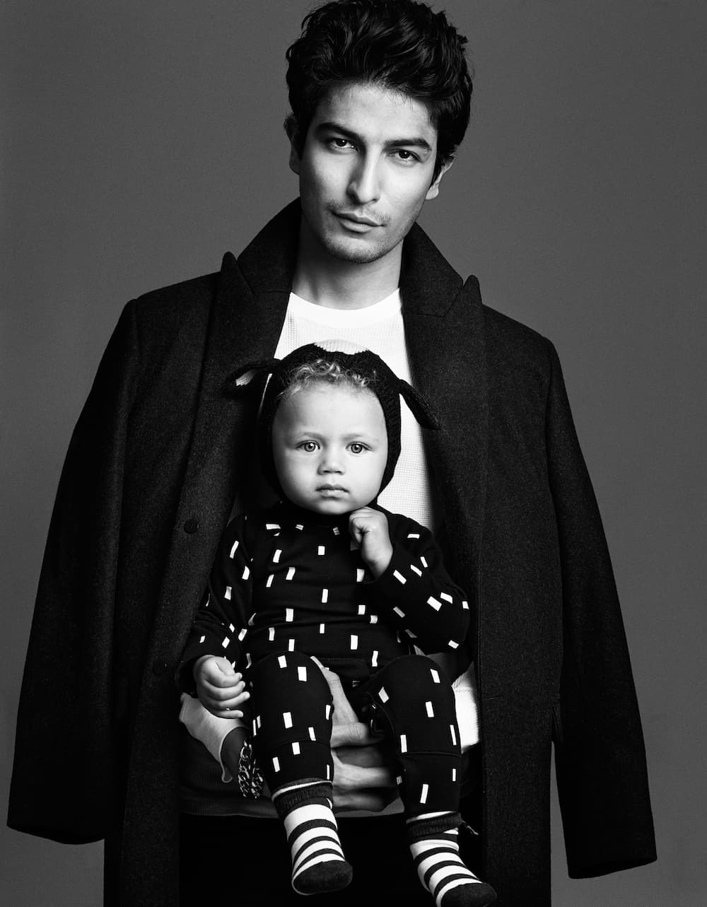 GentleMan by photographer Zoe Adlersberg & stylist Maria Walker. creating a series of striking black and white portraits of men with babies.